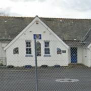 The mural can be seen on the exterior wall at Beulah's forgotten school