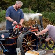 Getting ready for the show were these exhibitors with their miniature steam engine.