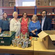 Our Communities Together has supported Raven House Trust. L-R, Community Foundation Wales' Katy Hales, Raven House Trust foodbank coordinator Samantha Harrhy, finance manager Becca Jevons, volunteer Gill Passey and Newsquest regional editor Gavin