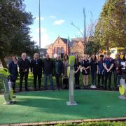 On yer bikes: Cardigan town councillors – pictured at last year’s launch of fitness equipment at Victoria Gardens – now say dog owners should be banned from the park.