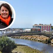 Aberaeron’s wooden pedestrian bridge over the river Aeron could be closed for up to a year, local councillor Elizabeth Evans has said. Main Picture: Google Street View.