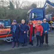 Family members L-R Lyn Thomas-Rees , Yvonne and Sue Rees with Eileen and Michael Evans with the new inshore lifeboat.