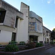 A man appeared at Swansea Crown Court accused of arranging child sex offences.
