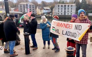 Protestors gathered at Prince Charles Quay Saturday to call for peace in Gaza.