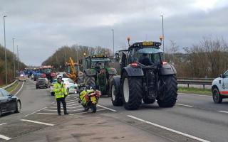 A number of tractors were among an estimated 200 vehicles.