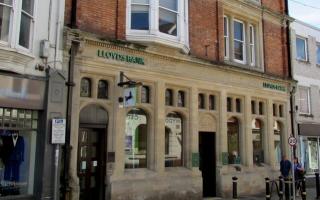 The decision to close LLoyds Bank in Cardigan has been branded 'extremely disappointing'