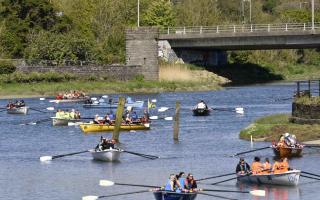 Crews line up at Cardigan old bridge for the start of the race.