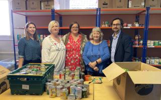 Our Communities Together has supported Raven House Trust. L-R, Community Foundation Wales' Katy Hales, Raven House Trust foodbank coordinator Samantha Harrhy, finance manager Becca Jevons, volunteer Gill Passey and Newsquest regional editor Gavin